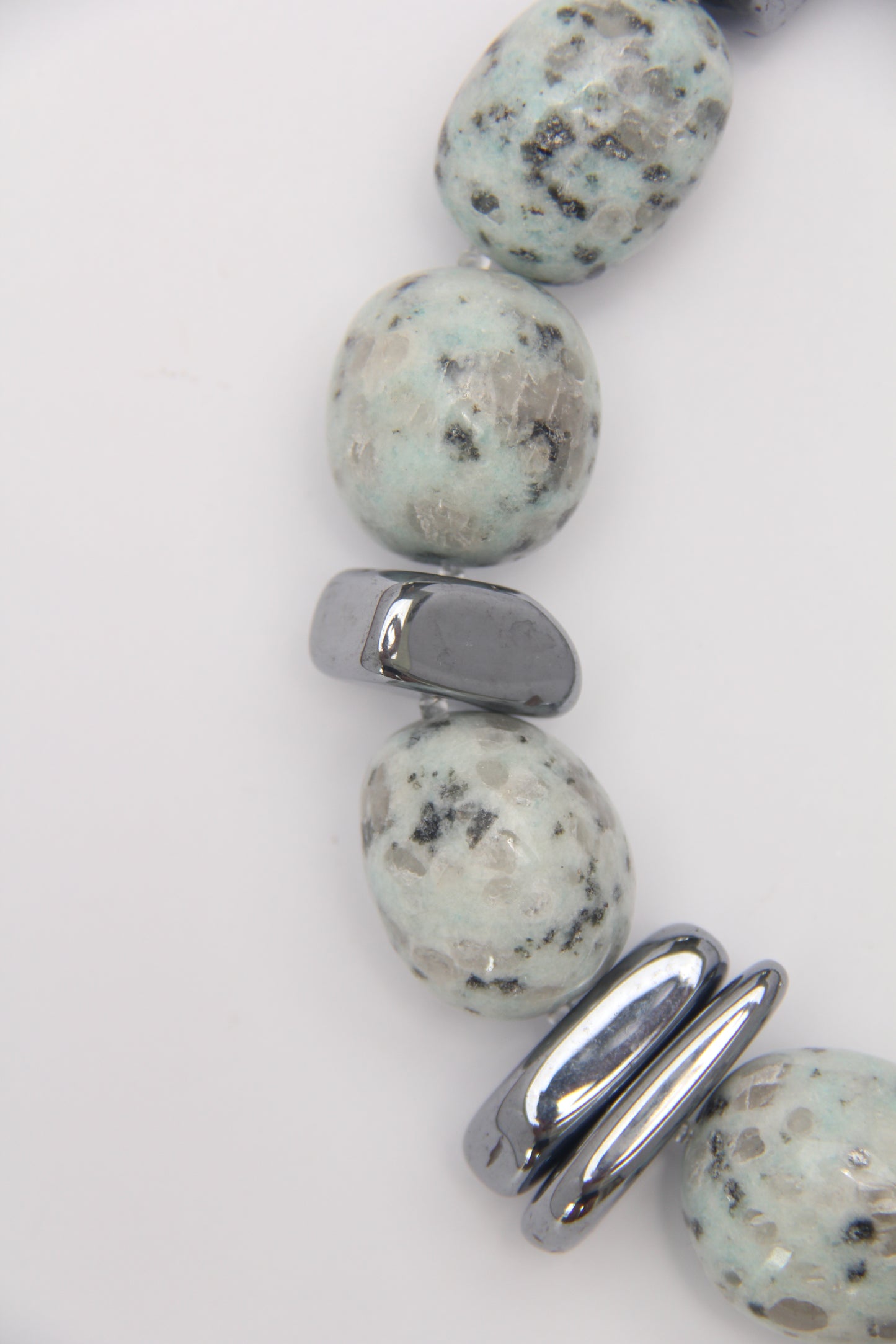 Necklace: kiwi jasper stone, titanium magnet