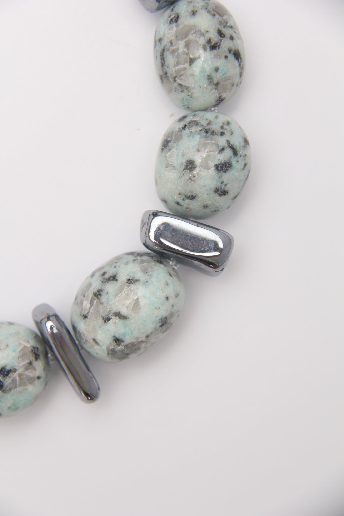 Necklace: kiwi jasper stone, titanium magnet