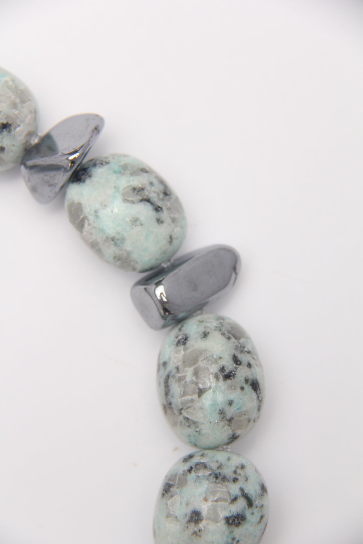 Necklace: kiwi jasper stone, titanium magnet