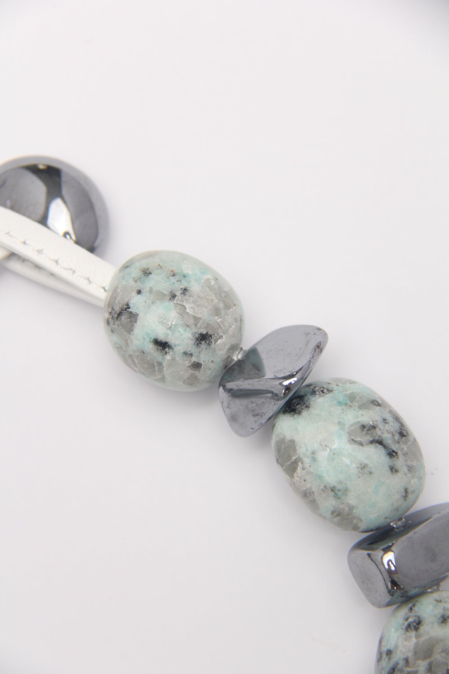 Necklace: kiwi jasper stone, titanium magnet