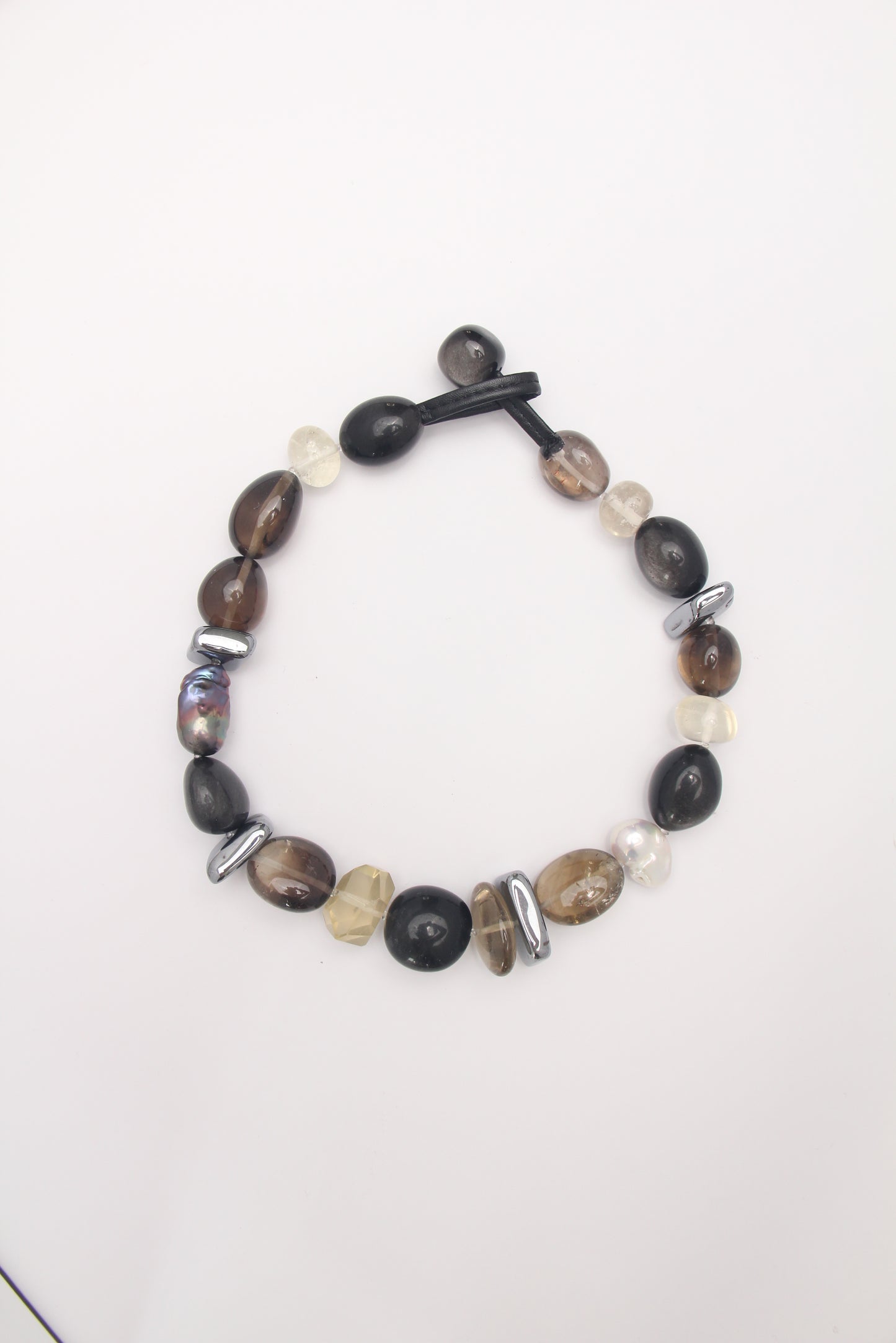 Necklace: silver obsidian, citrine, titanium magnet, pearls, smoky quartz