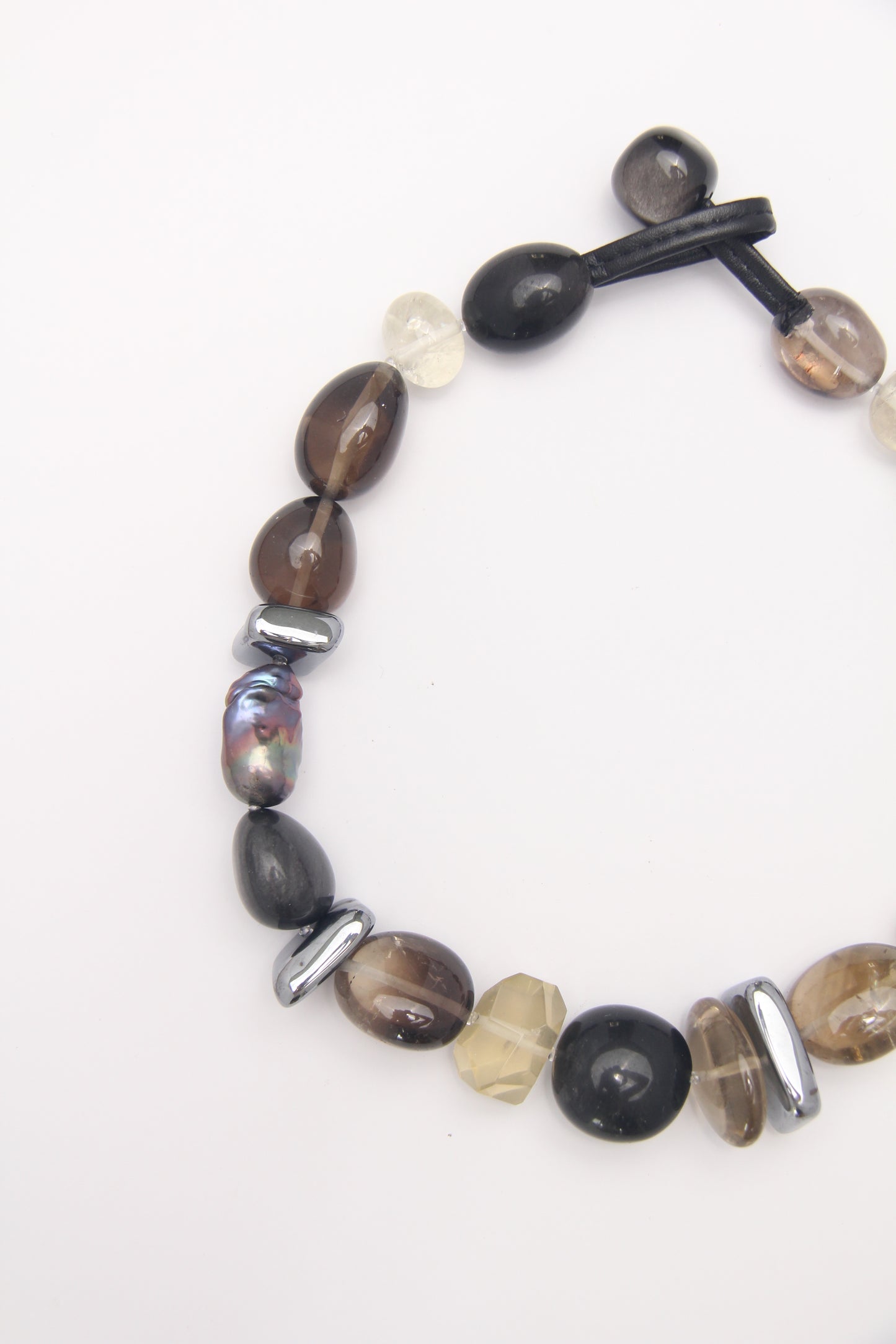 Necklace: silver obsidian, citrine, titanium magnet, pearls, smoky quartz