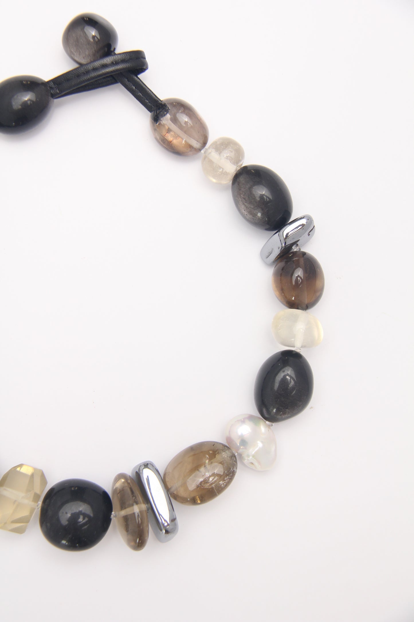 Necklace: silver obsidian, citrine, titanium magnet, pearls, smoky quartz