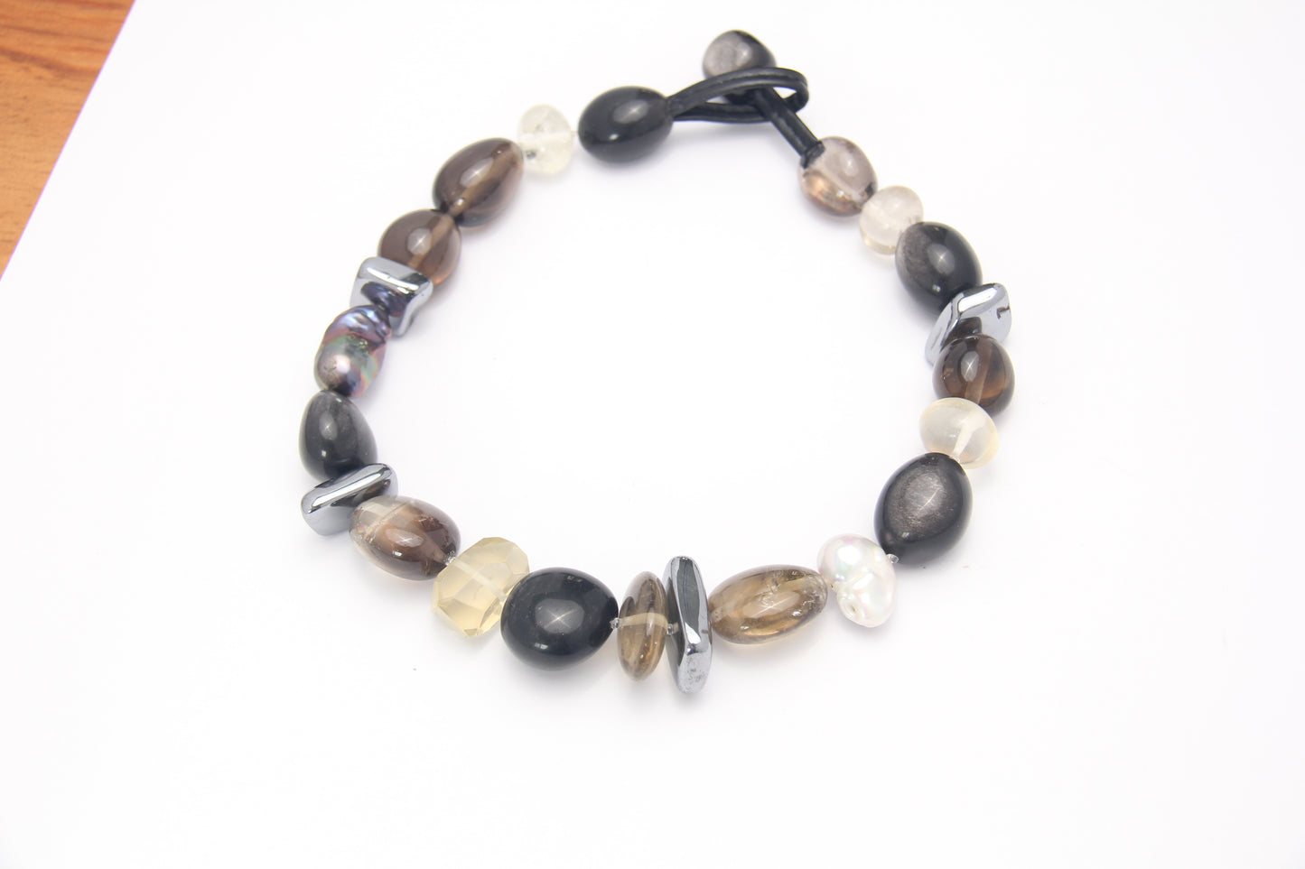 Necklace: silver obsidian, citrine, titanium magnet, pearls, smoky quartz