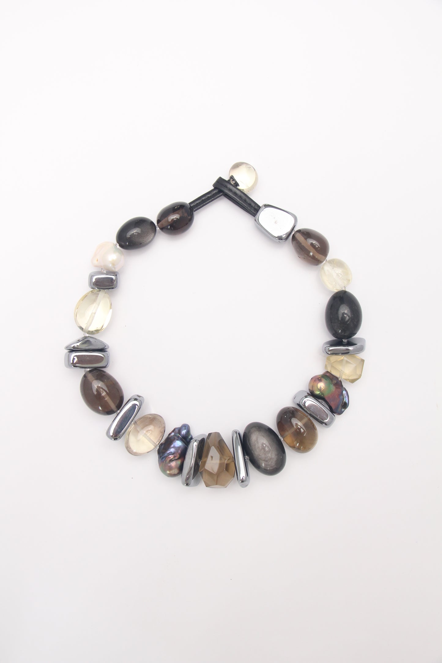 Necklace: silver obsidian, citrine, titanium magnet, pearls, smoky quartz