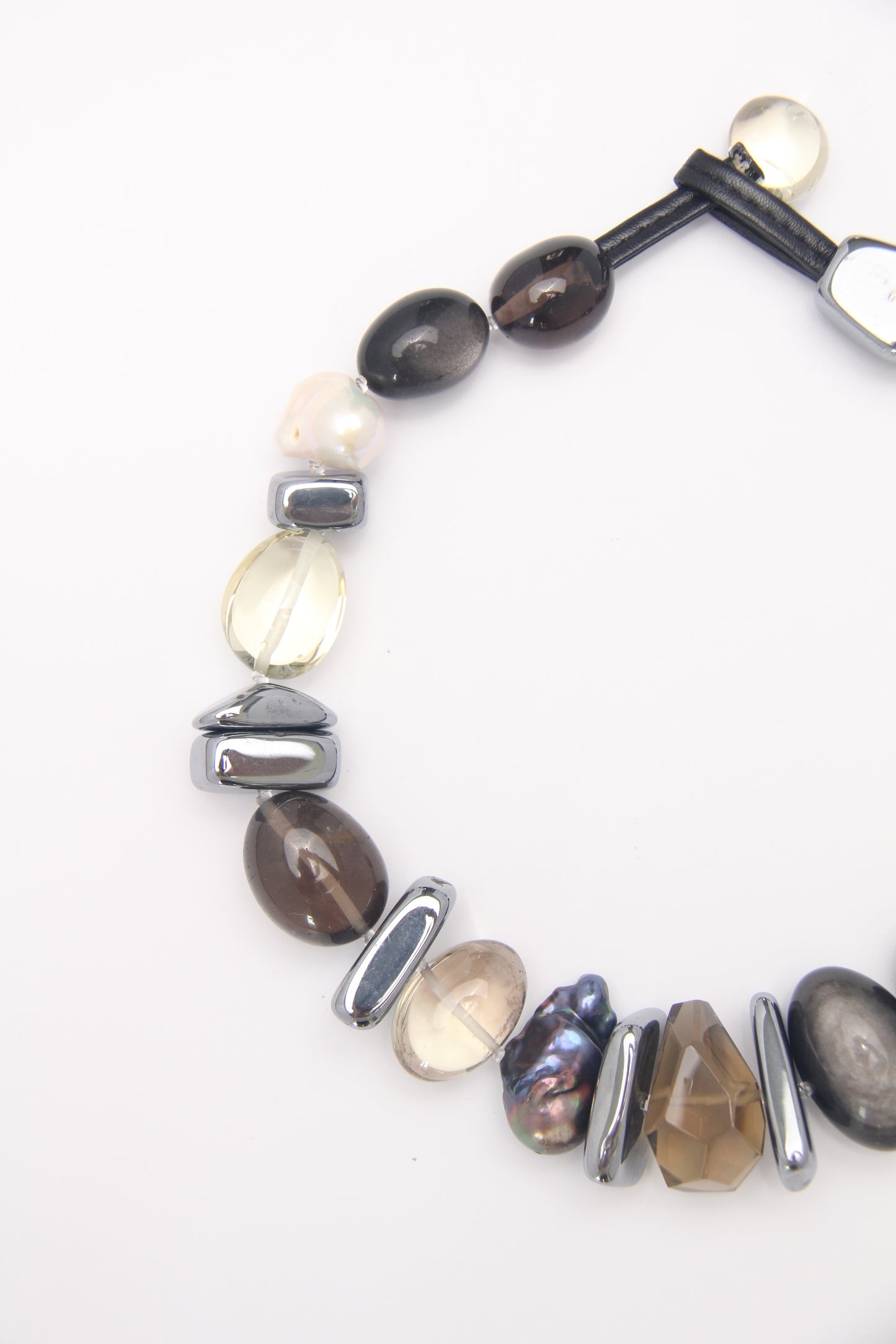 Necklace: silver obsidian, citrine, titanium magnet, pearls, smoky quartz