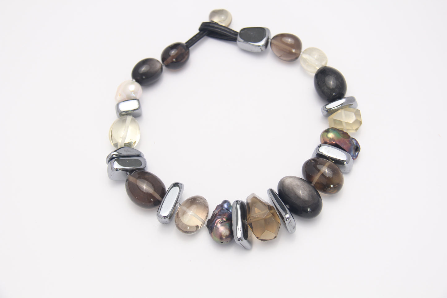 Necklace: silver obsidian, citrine, titanium magnet, pearls, smoky quartz