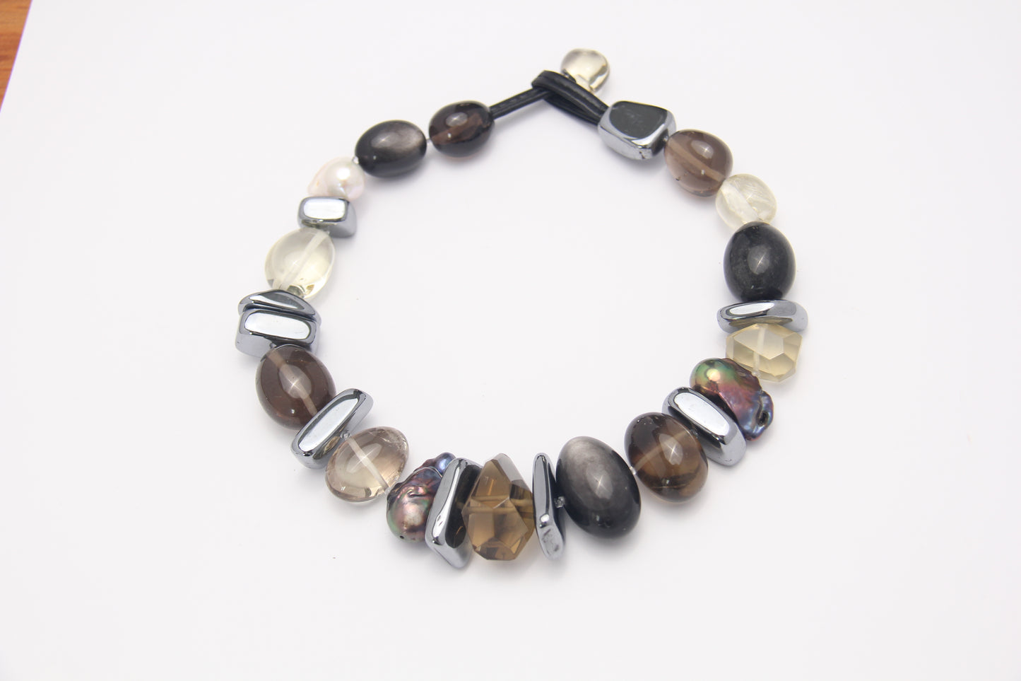 Necklace: silver obsidian, citrine, titanium magnet, pearls, smoky quartz