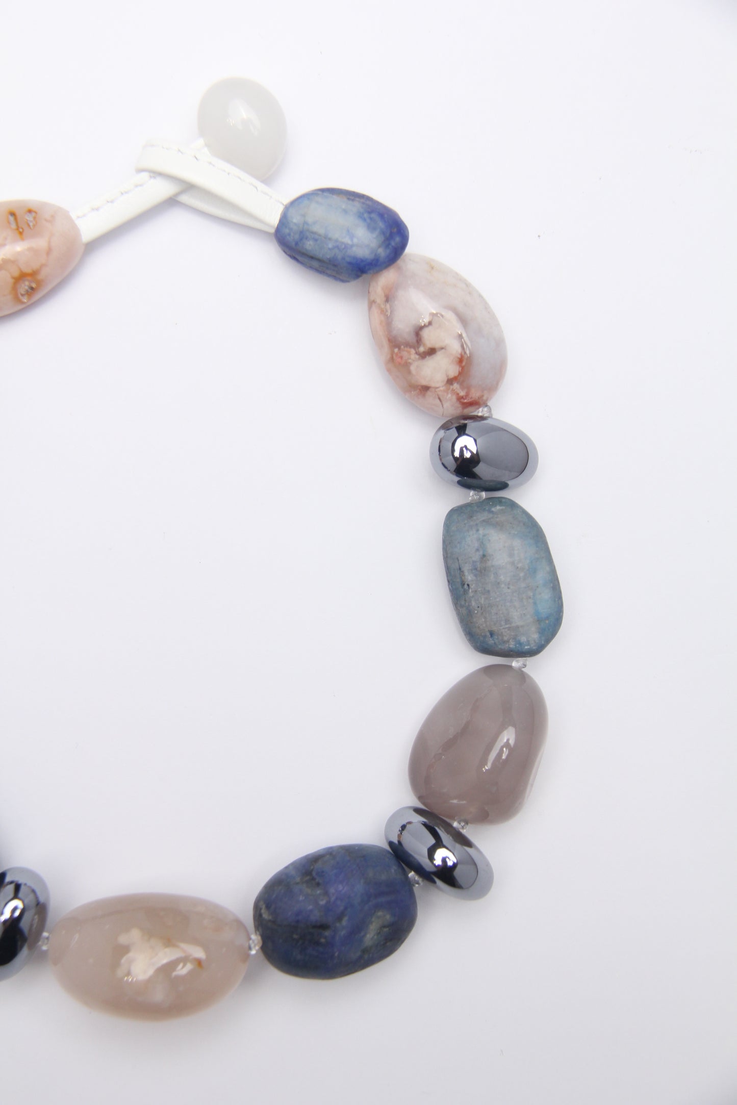 Necklace: kyanite, titanium magnet, rose chalcedony