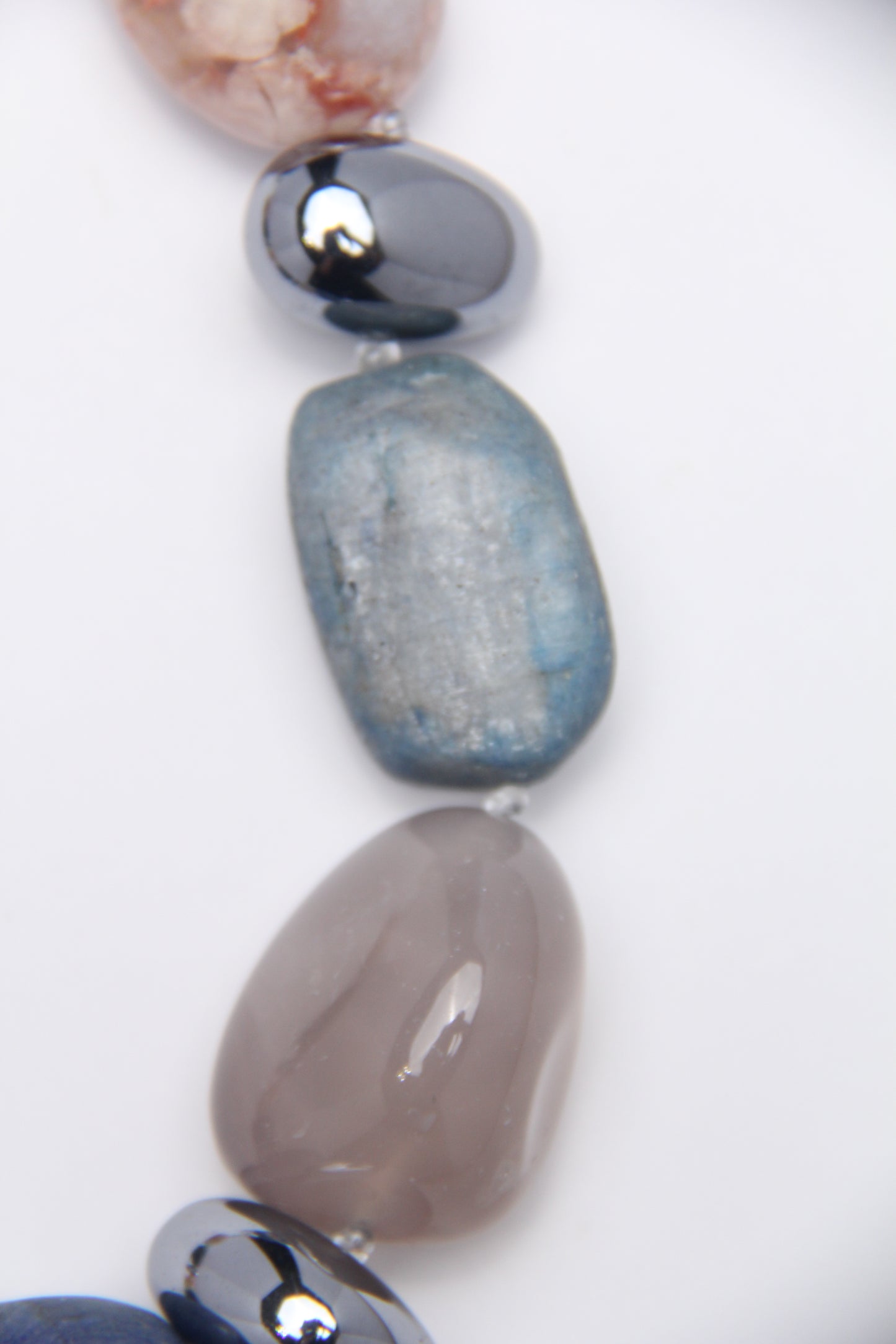 Necklace: kyanite, titanium magnet, rose chalcedony