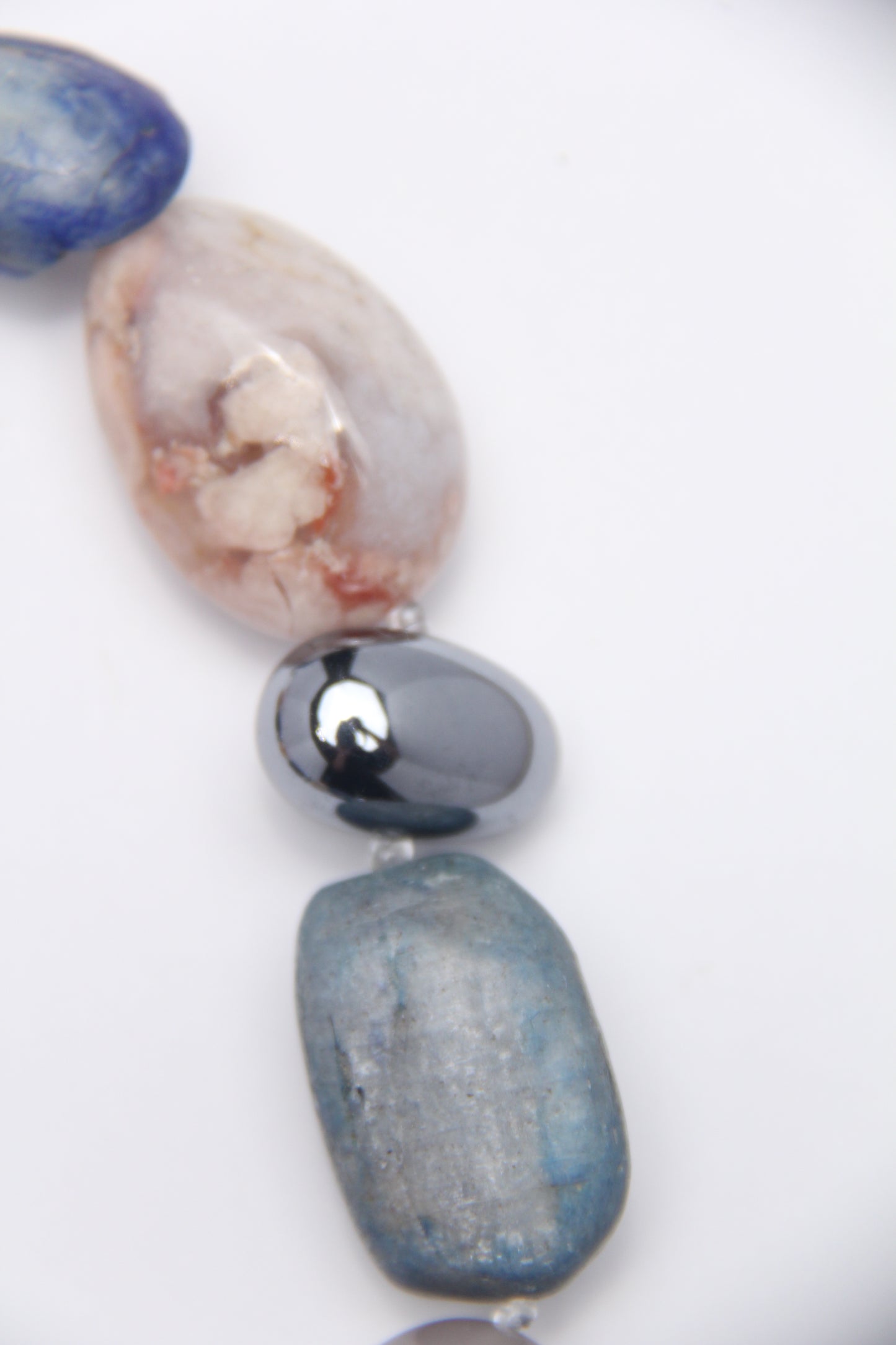 Necklace: kyanite, titanium magnet, rose chalcedony