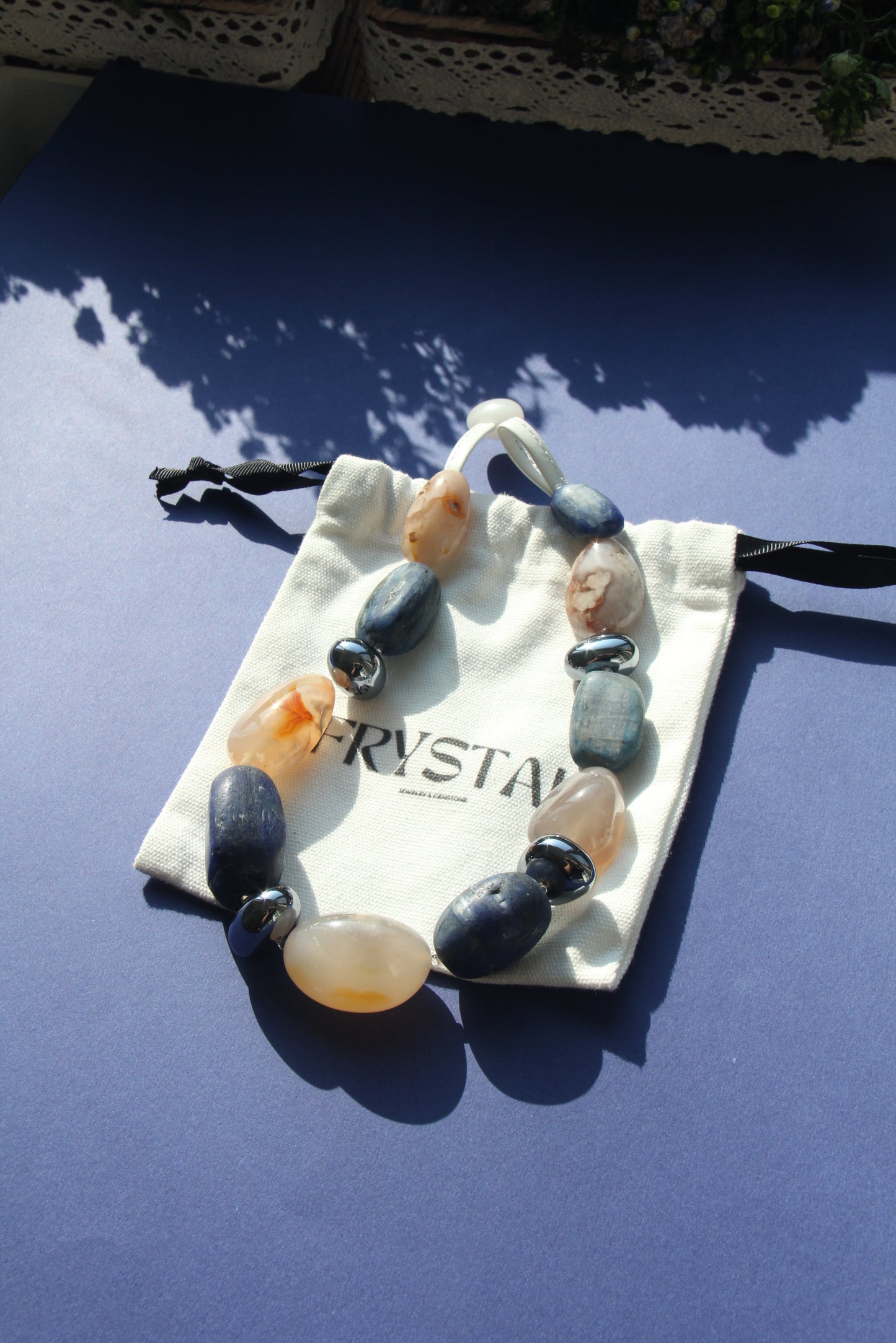 Necklace: kyanite, titanium magnet, rose chalcedony