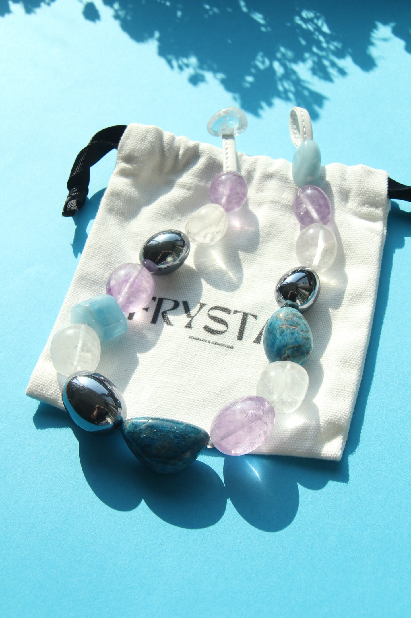 Necklace: amethyst, morganite, blue apatite, quartz, titanium magnet