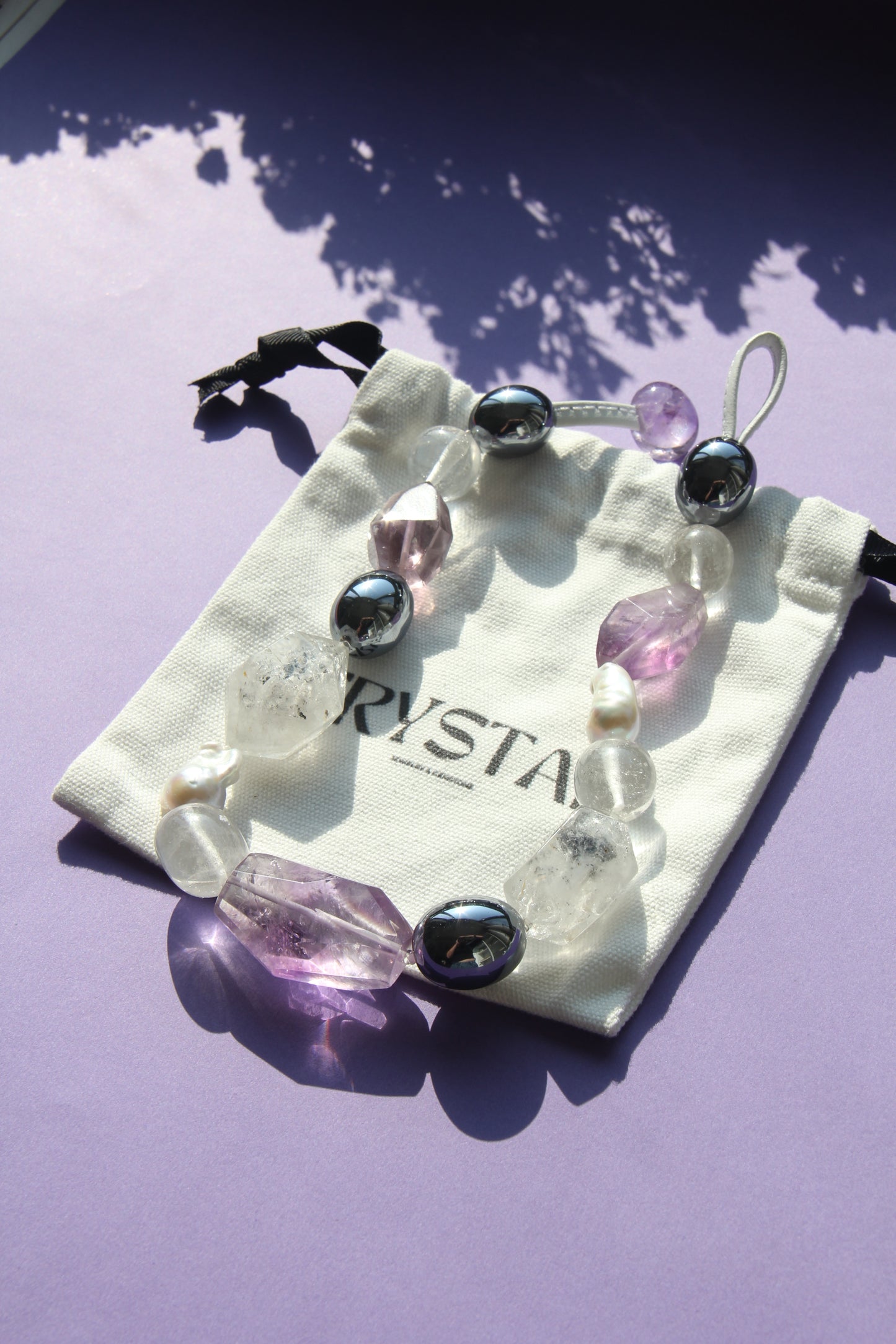 Necklace: amethyst, titanium magnet, herkimer diamond, pearls