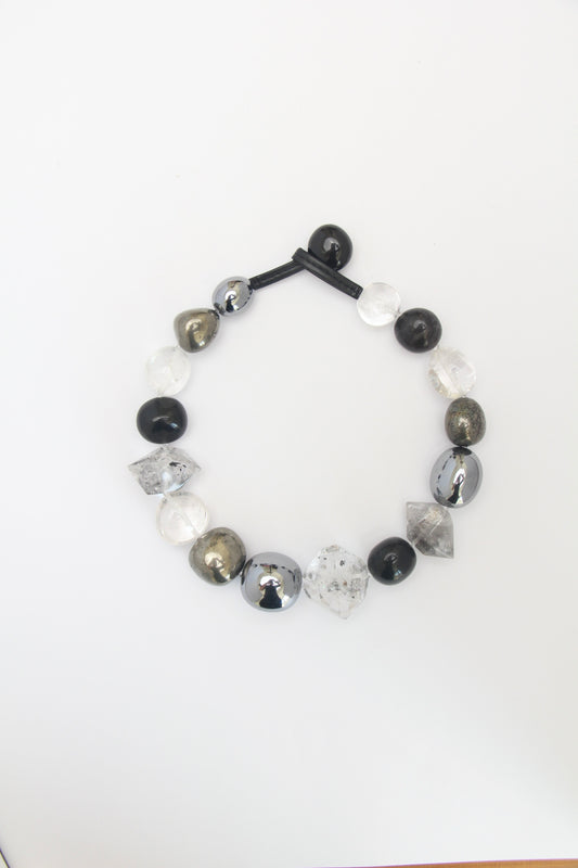 Necklace: quartz, obsidian, chalcopyrite, titanium magnet, herkimer diamond