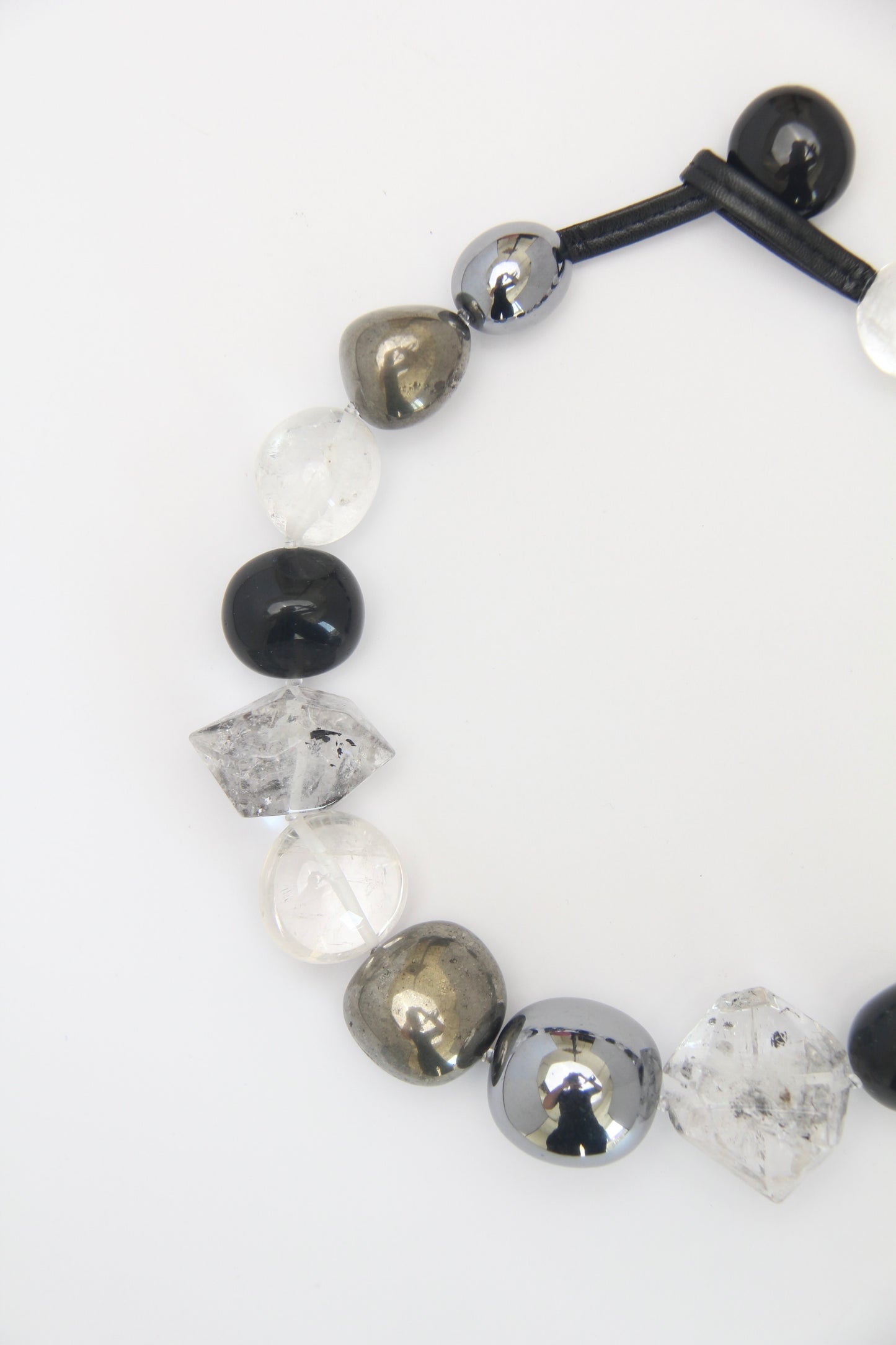 Necklace: quartz, obsidian, chalcopyrite, titanium magnet, herkimer diamond