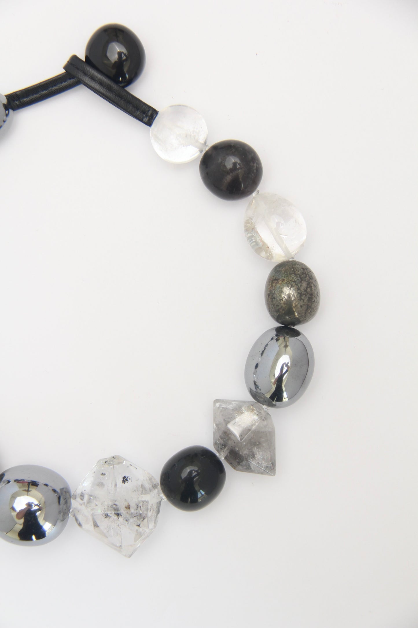 Necklace: quartz, obsidian, chalcopyrite, titanium magnet, herkimer diamond