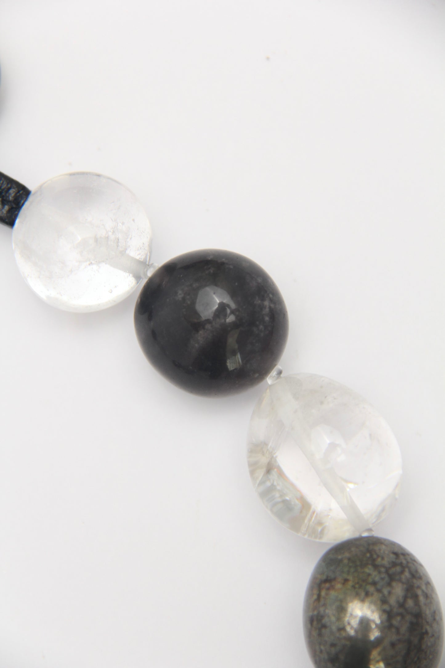 Necklace: quartz, obsidian, chalcopyrite, titanium magnet, herkimer diamond