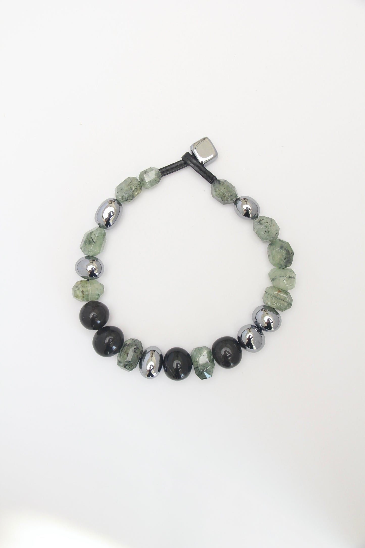 Necklace: prehnite, titanium magnet, obsidian