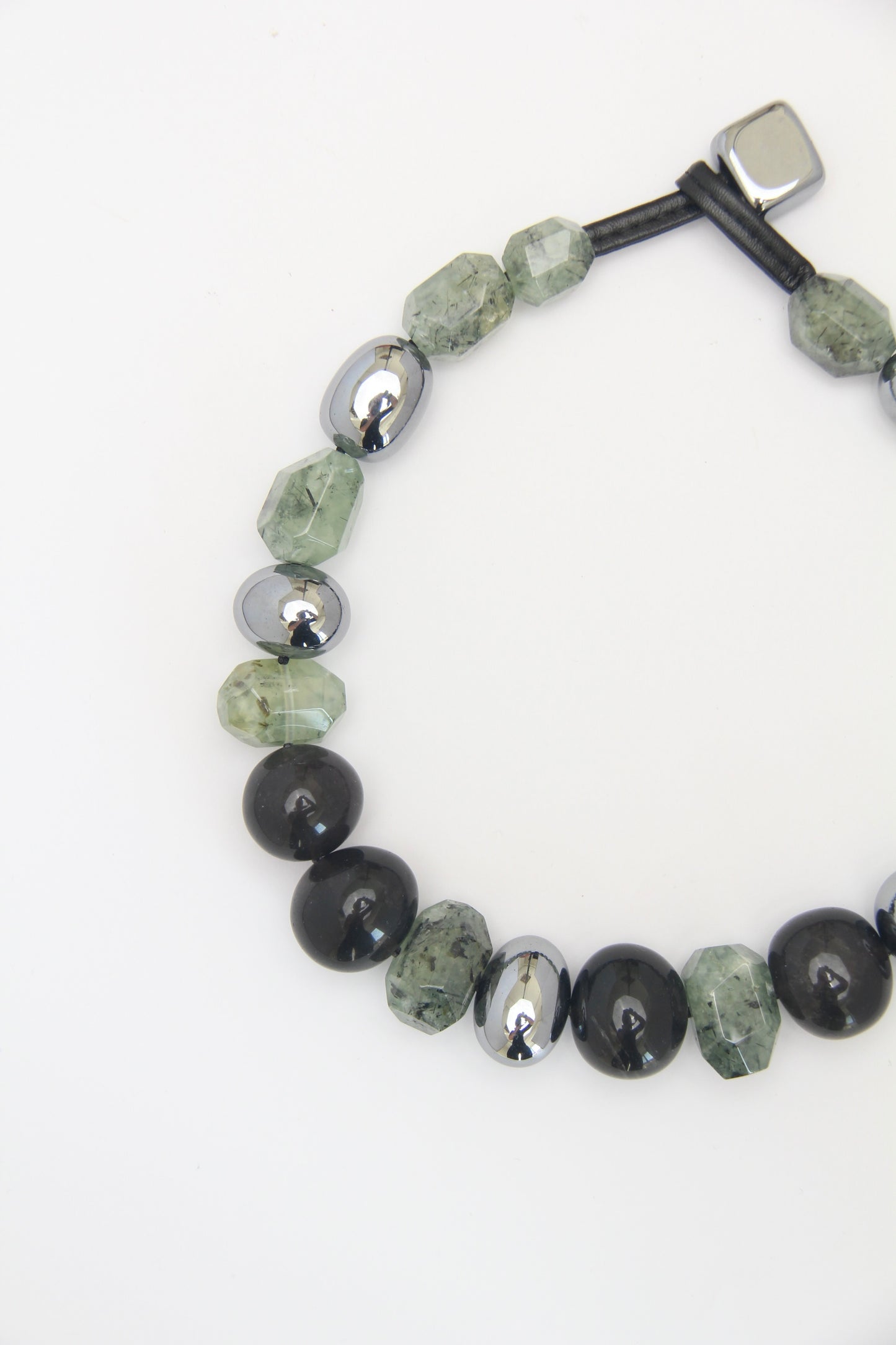 Necklace: prehnite, titanium magnet, obsidian