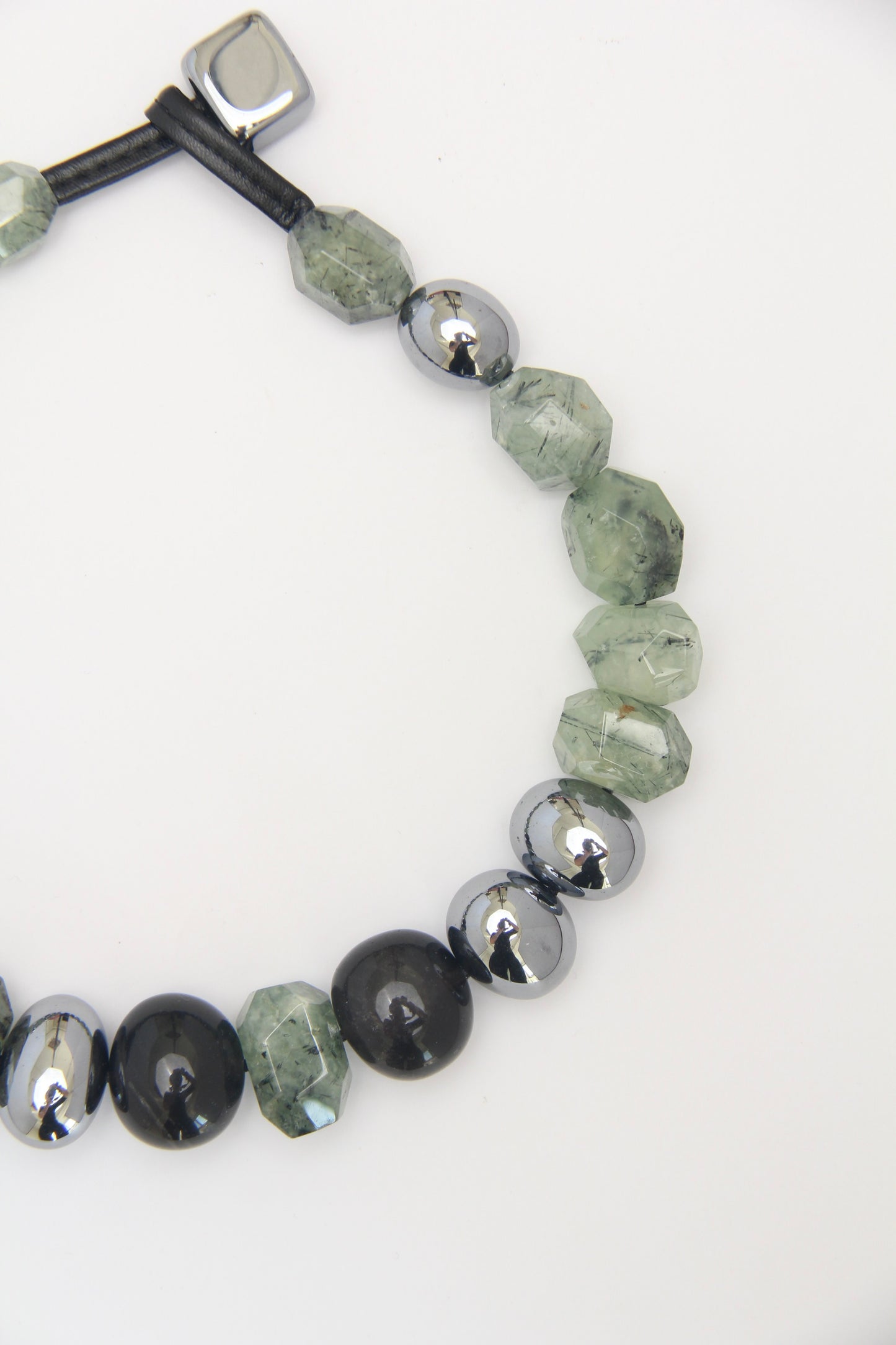 Necklace: prehnite, titanium magnet, obsidian