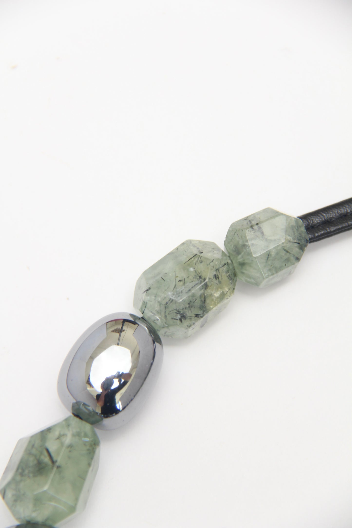 Necklace: prehnite, titanium magnet, obsidian