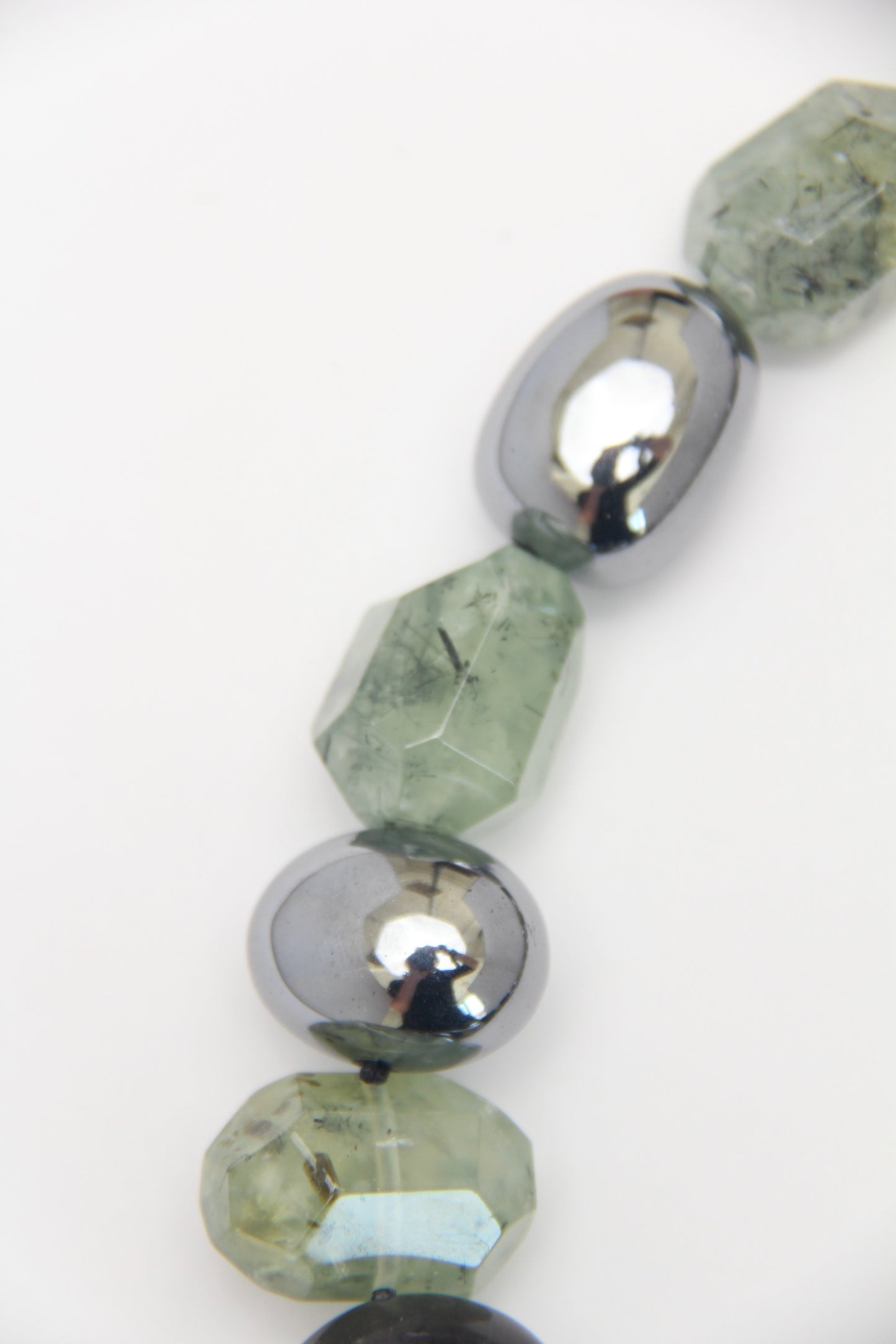 Necklace: prehnite, titanium magnet, obsidian