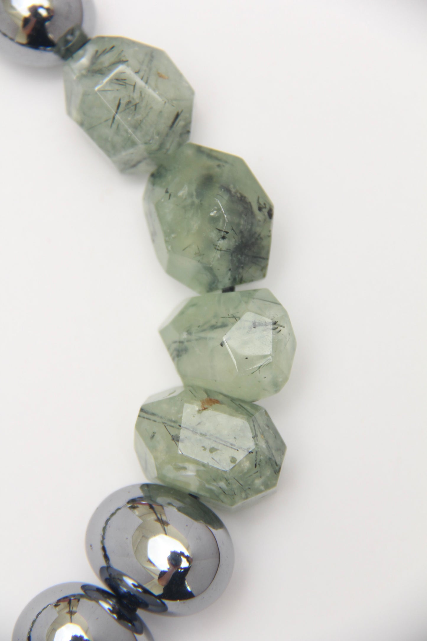 Necklace: prehnite, titanium magnet, obsidian