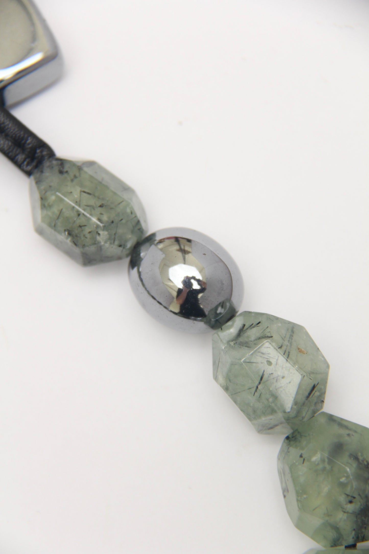 Necklace: prehnite, titanium magnet, obsidian