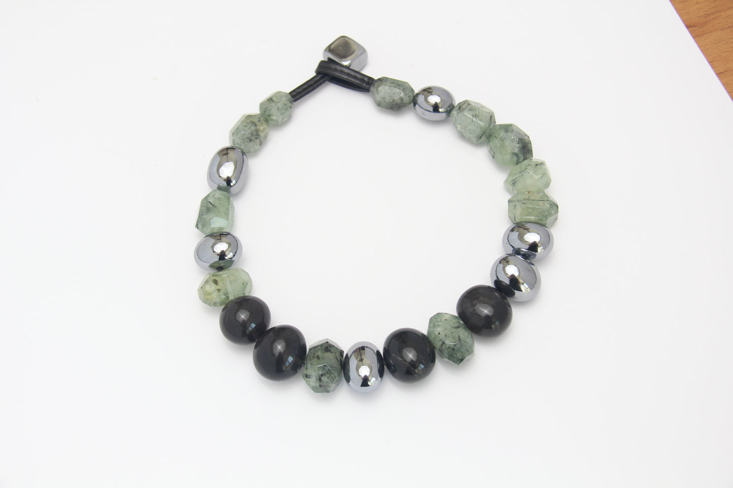 Necklace: prehnite, titanium magnet, obsidian