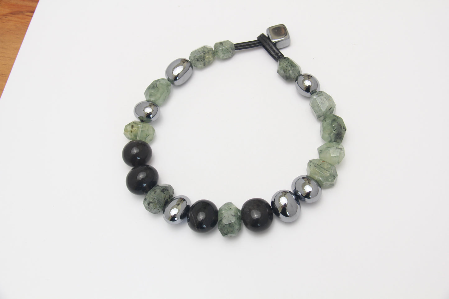 Necklace: prehnite, titanium magnet, obsidian