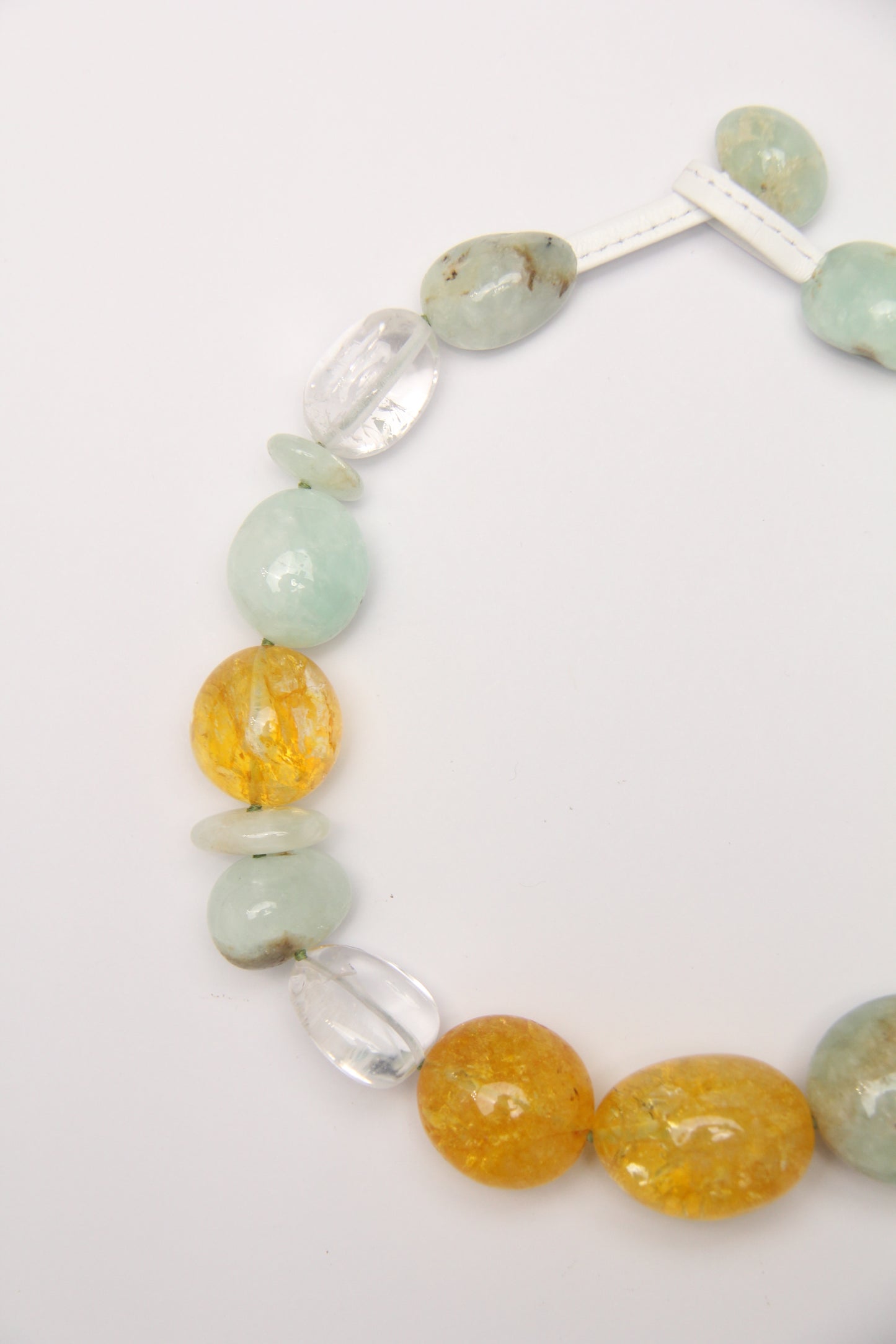 Necklace: prehnite, quartz, colored hematoid quartz