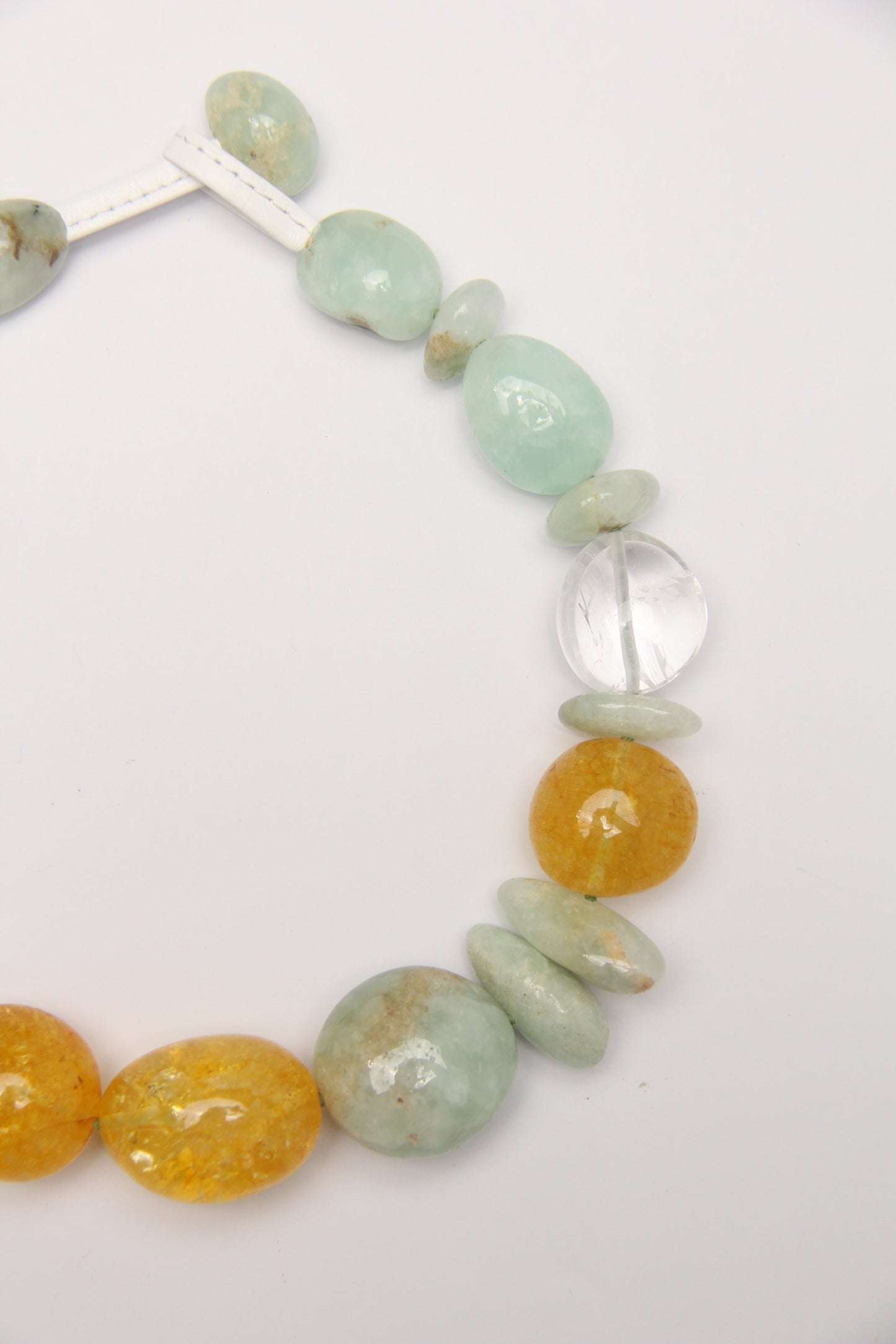 Necklace: prehnite, quartz, colored hematoid quartz