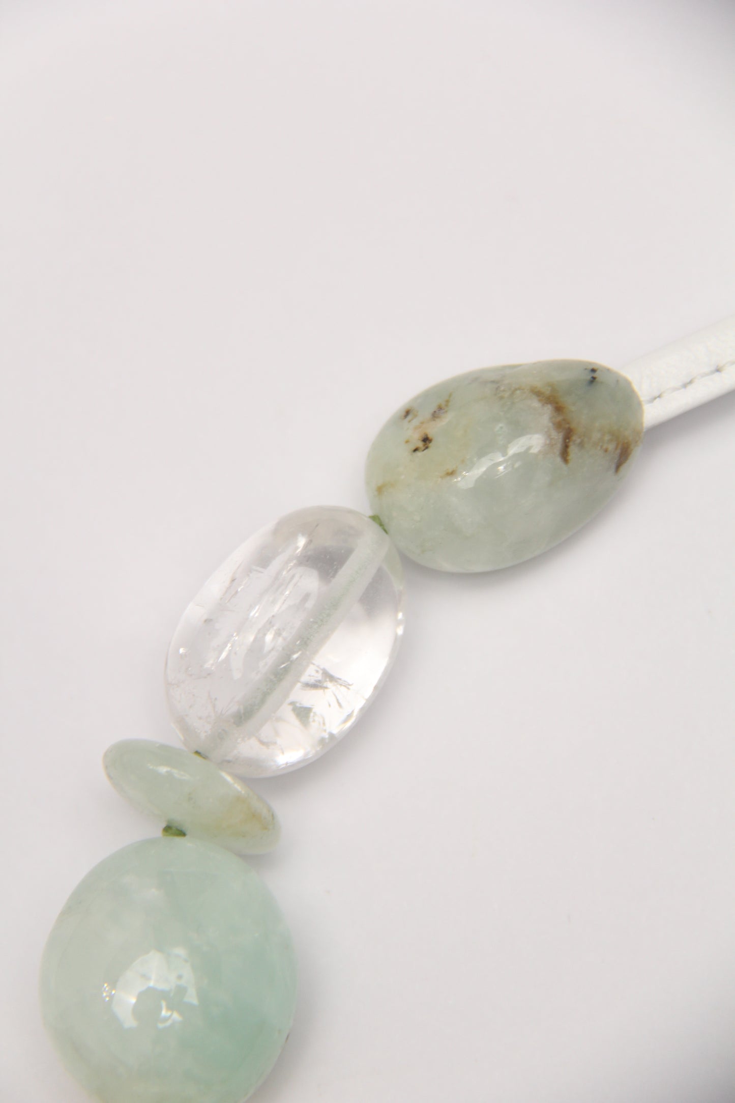 Necklace: prehnite, quartz, colored hematoid quartz