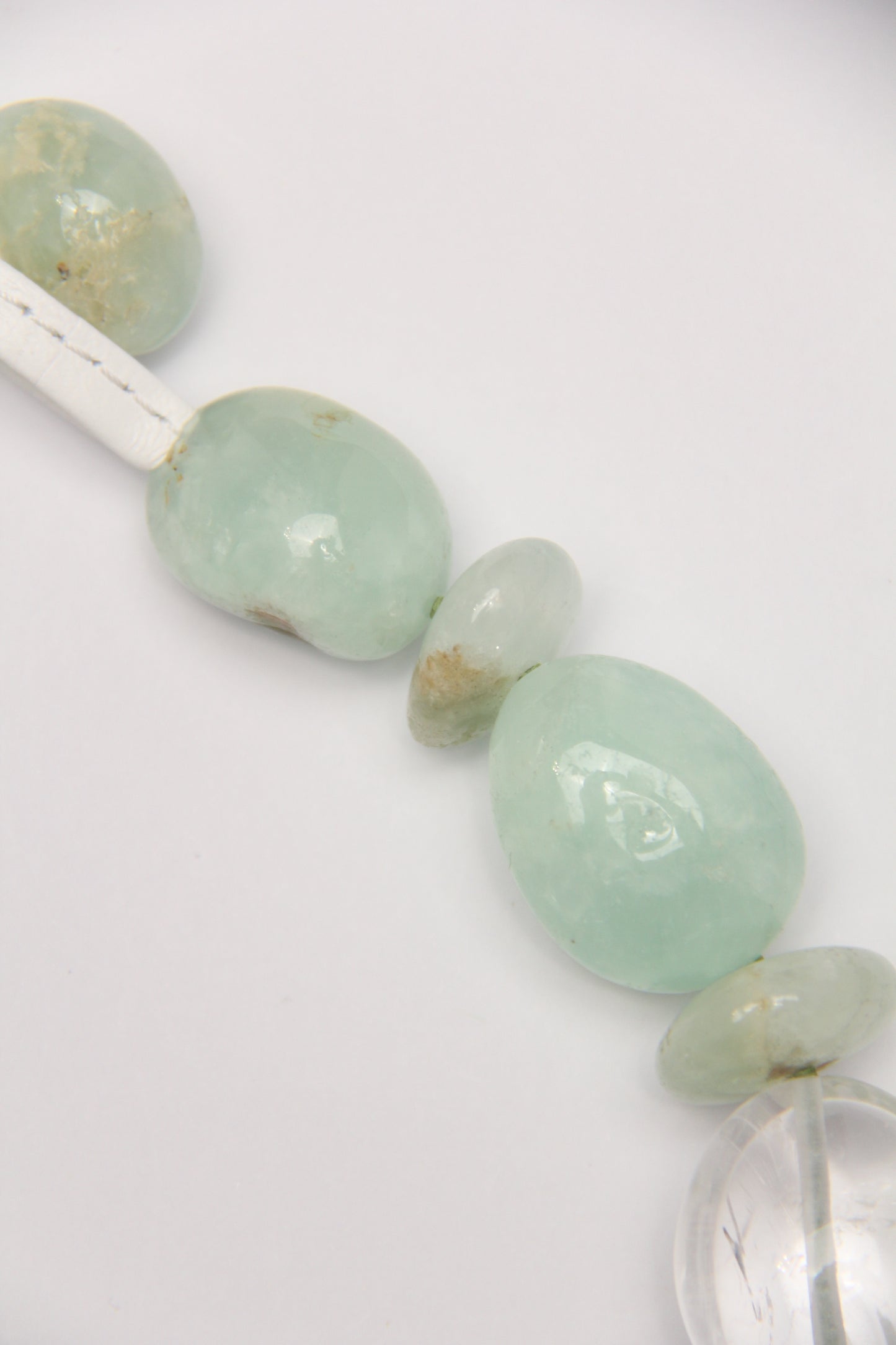 Necklace: prehnite, quartz, colored hematoid quartz