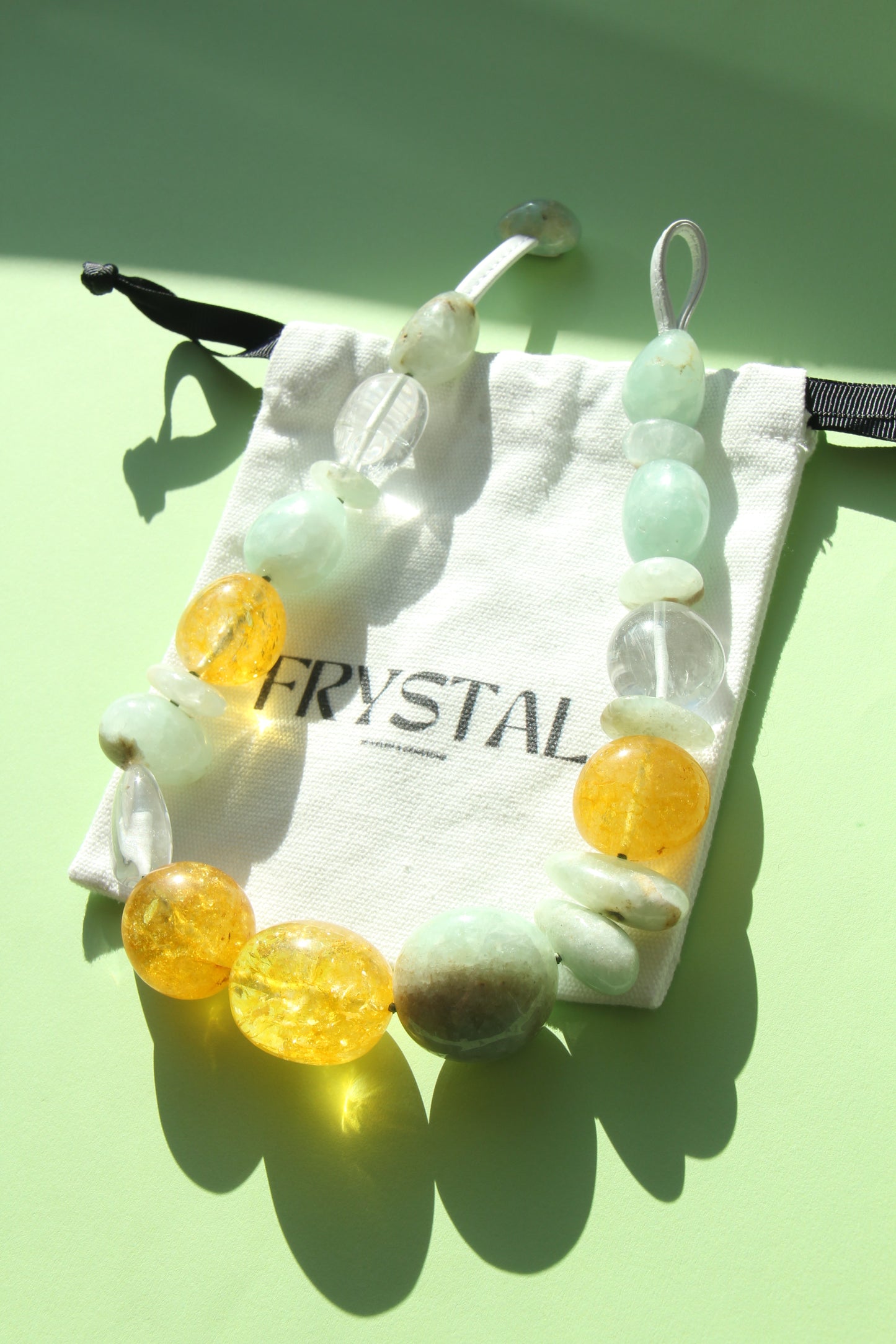 Necklace: prehnite, quartz, colored hematoid quartz