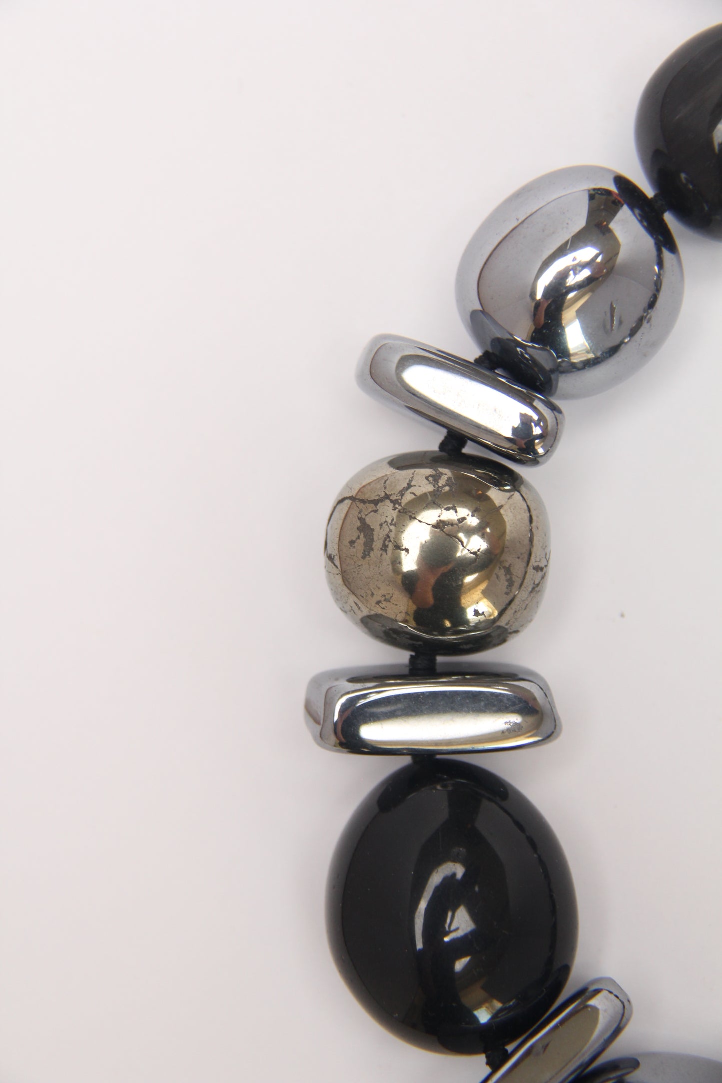 Necklace: black tourmaline, obsidian, chalcopyrite, titanium magnet