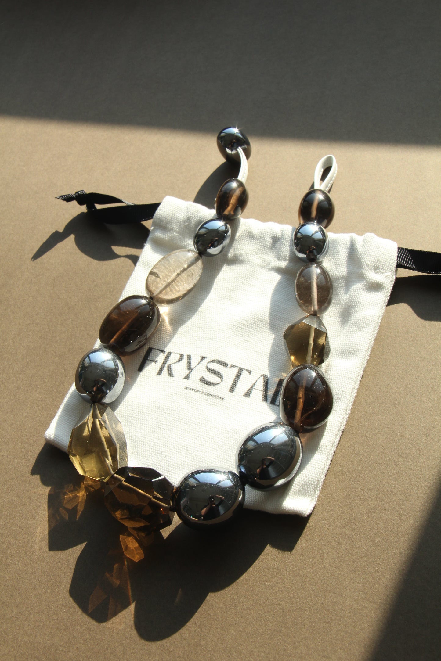 Necklace: smoky quartz, titanium magnet