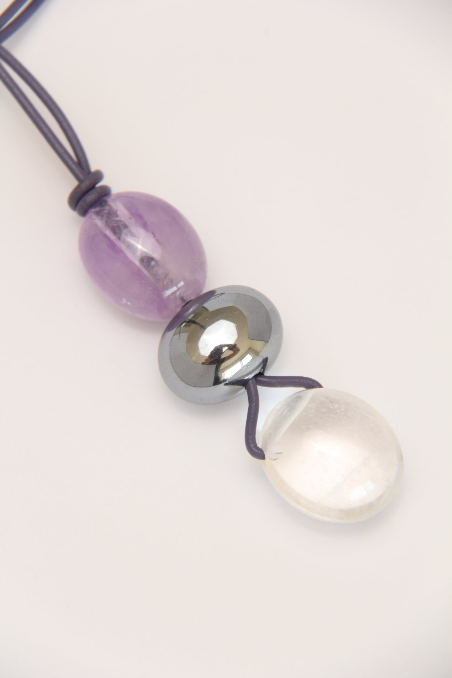 Pendant: amethyst, titanium magnet, quartz