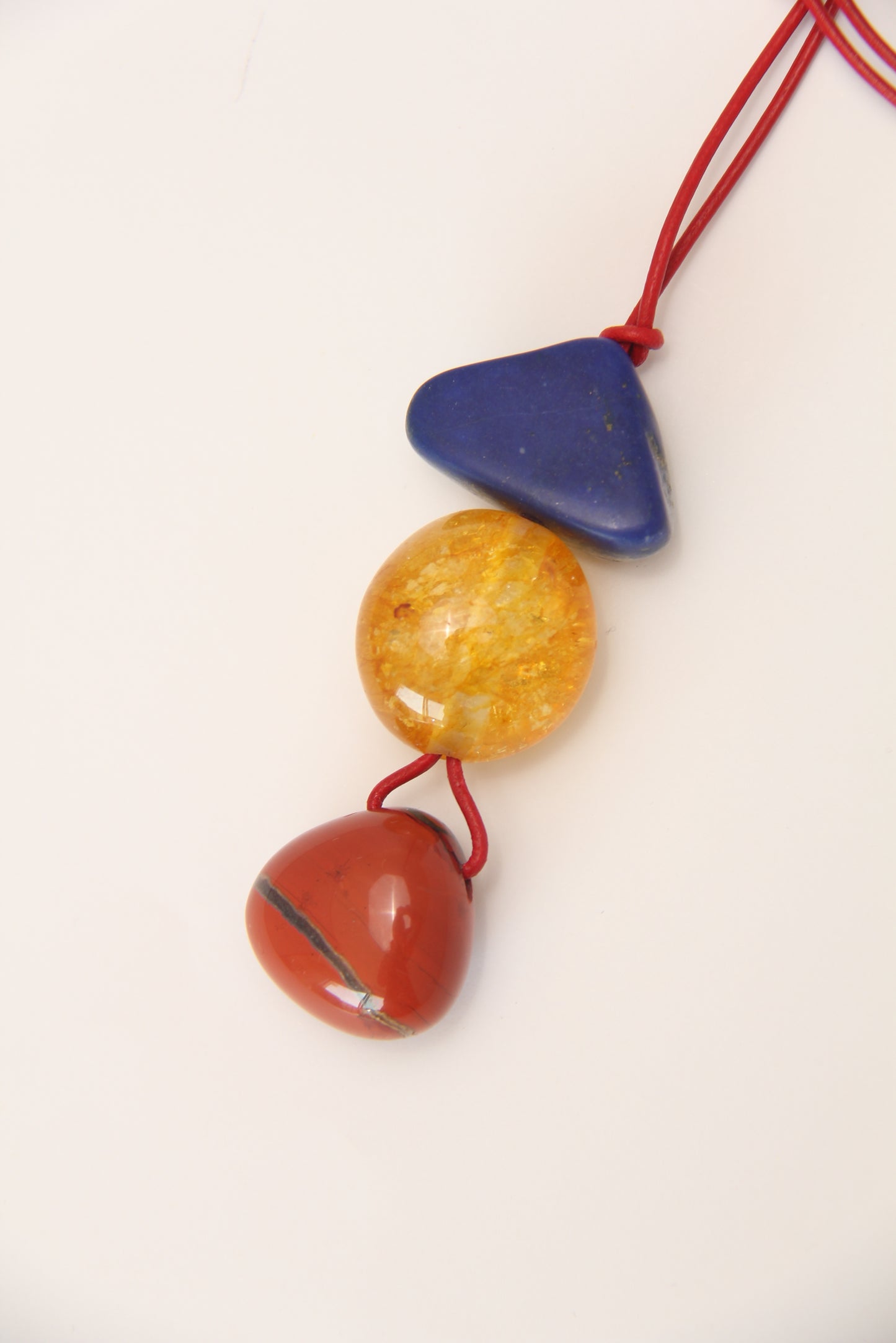 Pendant: lapis lazuli, red jasper stone, colored quartz