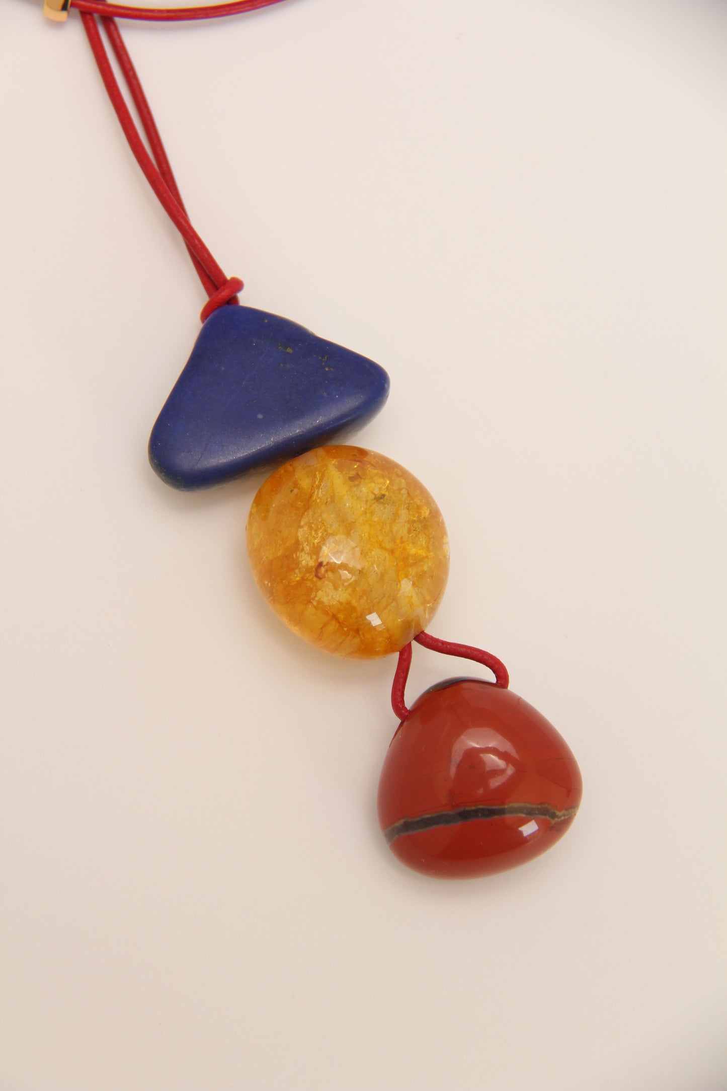 Pendant: lapis lazuli, red jasper stone, colored quartz